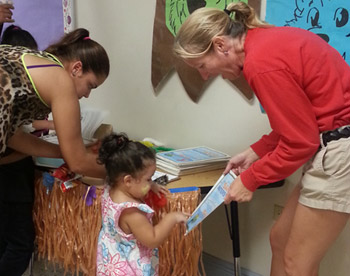 Port Tampa families also learned about water safety from South Tampa Y staff during West Shore Elementary's reading night.